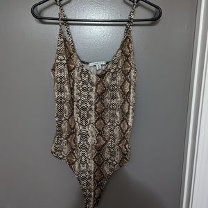 Celebrity Pink Snake Skin Body Suit